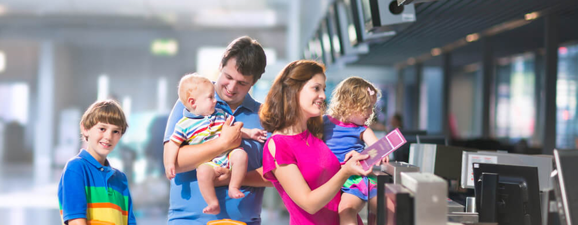 Slide 4 Image of Family at Airport